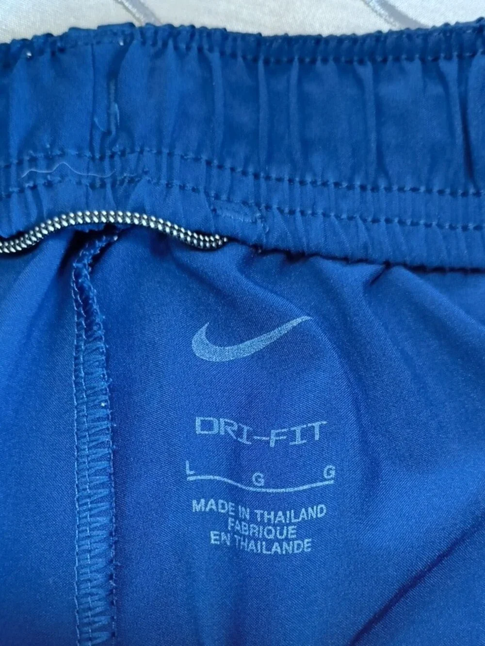Nike Royal Blue Kids Athletic Shorts with White Swoosh AE